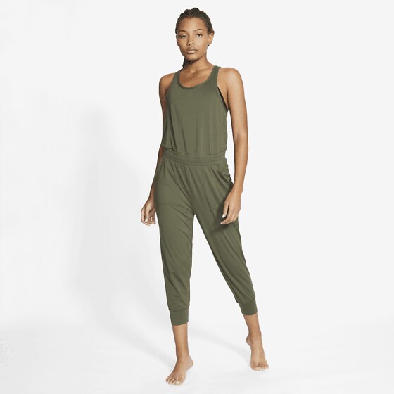 NIKE W NK YOGA JUMPSUIT sivustolla stadium.fi